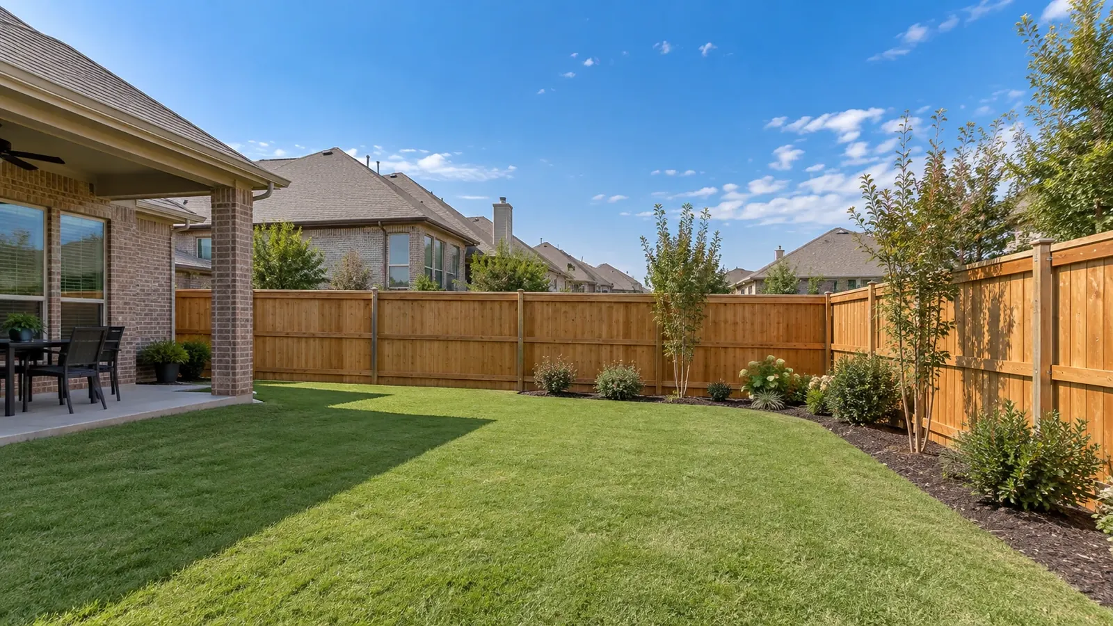 Residential wood privacy fence enclosing an Allen backyard